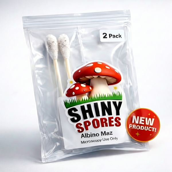 A product image depicting 2 mushroom spore swabs in a packet featuring the Shiny Spores logo and a New Product sticker. The strain is Albino Maz