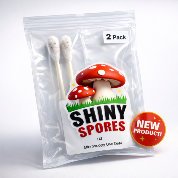 A product image depicting 2 mushroom spore swabs in a packet featuring the Shiny Spores logo and a New Product sticker. The strain is TAT